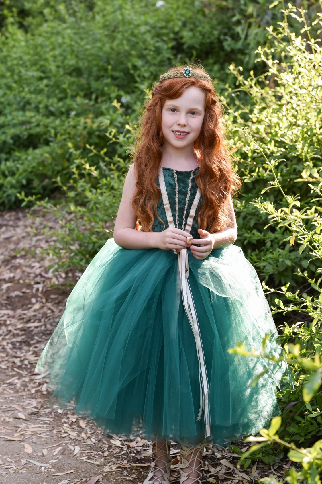 Green Meredith inspired costume dress for baby and toddler. Deep green with gold trim.