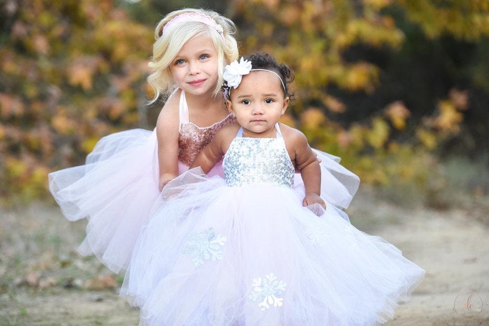 White, Pink and Silver Winter Wonderland Dress - Includes Snowflakes adorning the long skirt. Light pink, White and Silver Sequins!