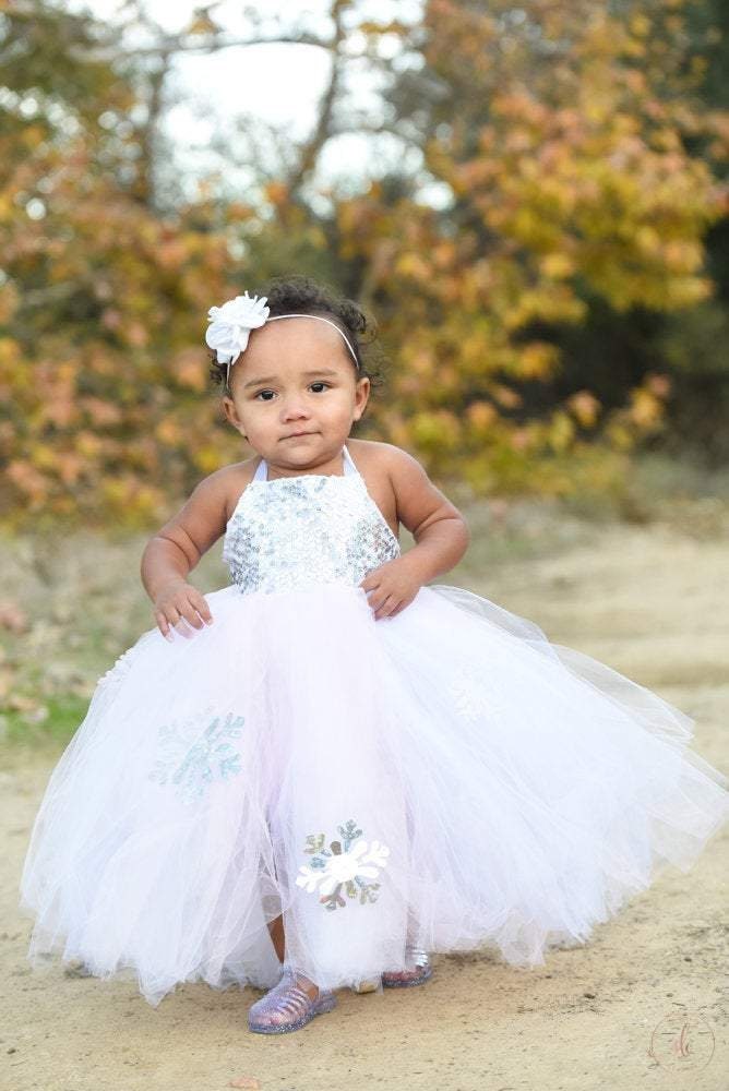 White, Pink and Silver Winter Wonderland Dress - Includes Snowflakes adorning the long skirt. Light pink, White and Silver Sequins!