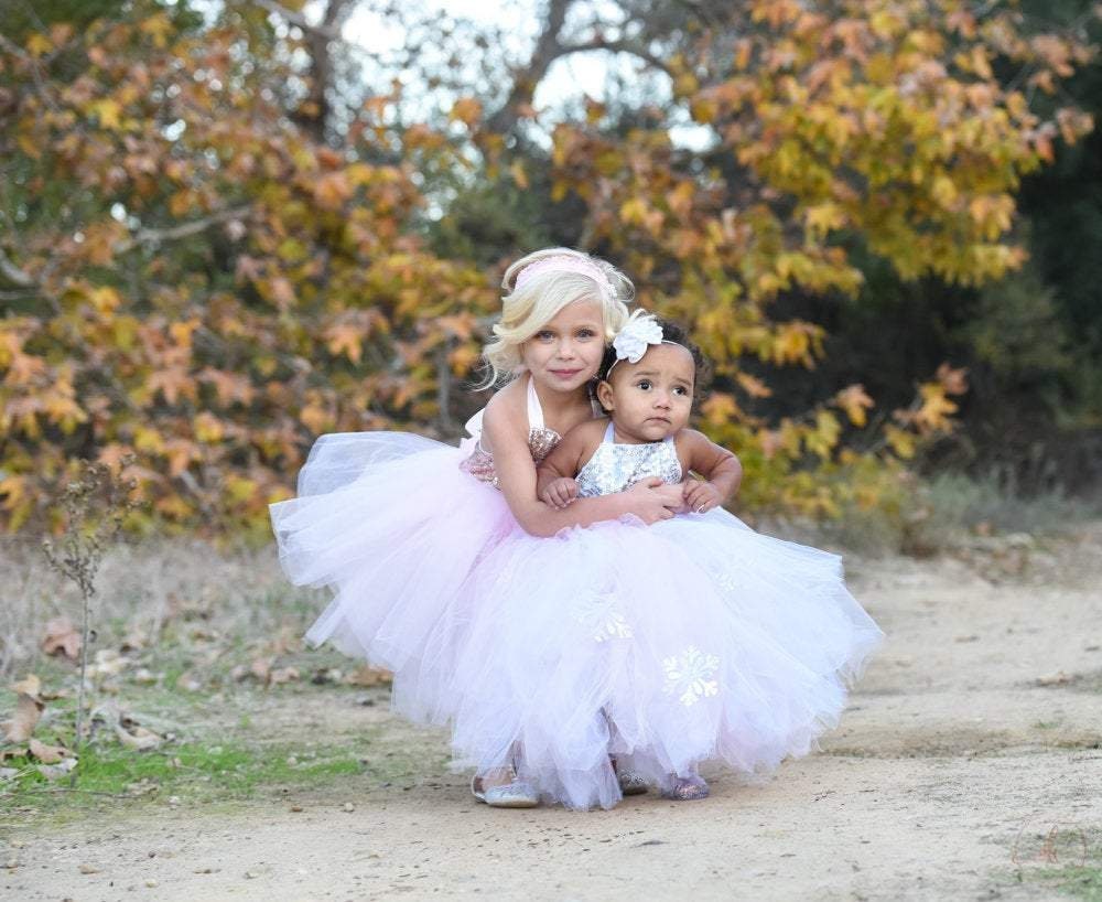 White, Pink and Silver Winter Wonderland Dress - Includes Snowflakes adorning the long skirt. Light pink, White and Silver Sequins!