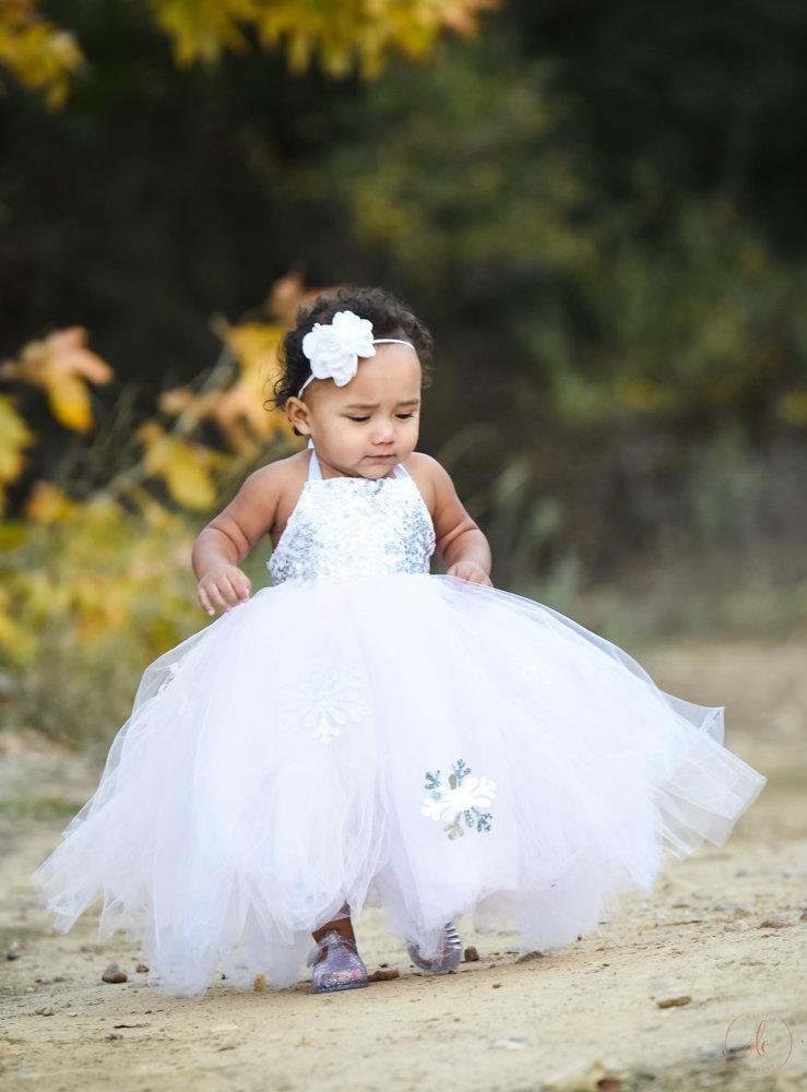 White, Pink and Silver Winter Wonderland Dress - Includes Snowflakes adorning the long skirt. Light pink, White and Silver Sequins!